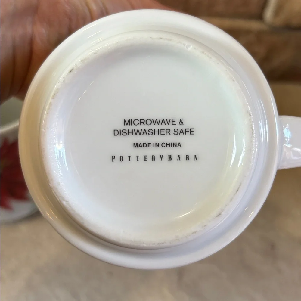 Pottery Barn ceramic holiday mugs with Holly and poinsettias